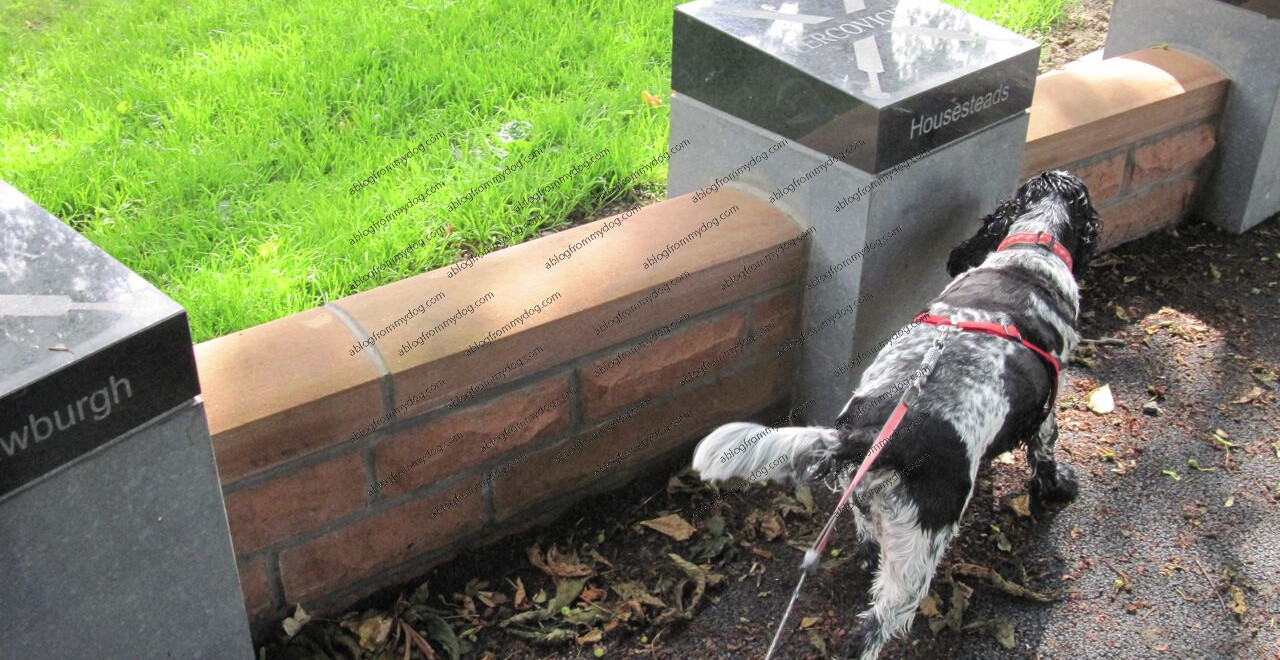 Charlie inspects one of the new art works