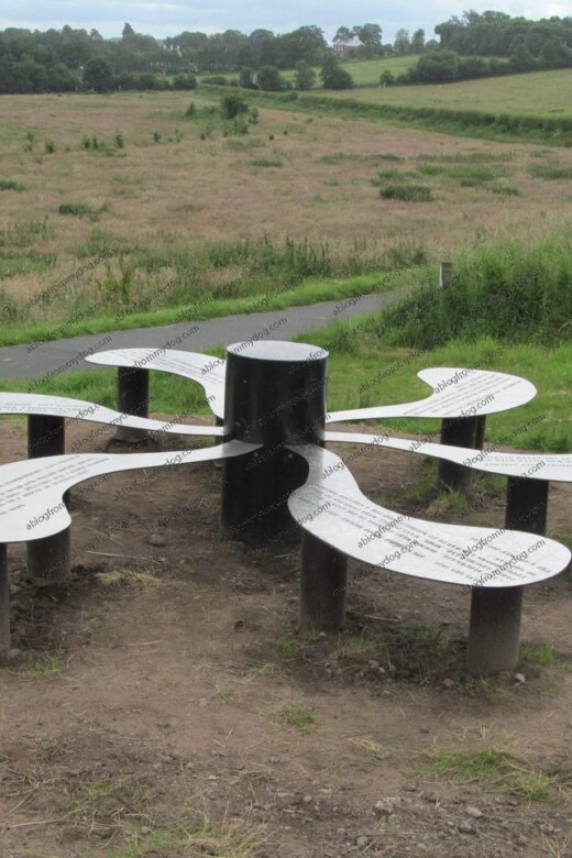 The information henge is positioned on Cummersdale Holmes overlooking the River Caldew on the outskirts of the City of Carlisle