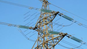 A pylon buzzing in the damp cold air