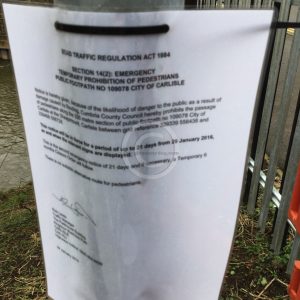 Official notice on a fence near to the closure